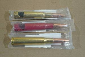 2 Lucky Shot 50 Cal Bullet Bottle Openers and Beer Tap