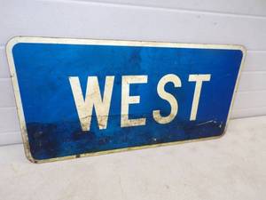 Metal WEST Sign