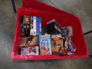 VHS Movies and Wood Shelf