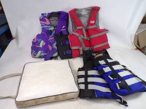 3 Life Jackets and Boat Cushion