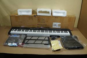 lot 111 image: Electric Keyboard