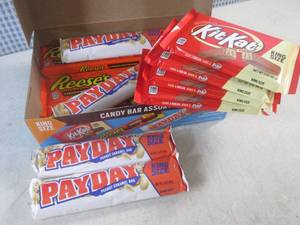 lot 292 image: (B-4) Box of 12 King Size Candy Bars 4 Each of Kit Kat, Pay Day and Reeses Peanut Butter Cups Best by Date Vary March - Aug 2024