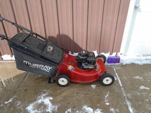 Murray 3.75 hp push mower with bagger. Used condition. Tested & works. As shown.