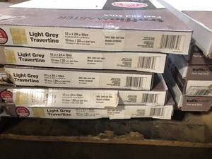 27 Boxes of TrafficMaster Light Grey Travertine 4 MIL x 12 in. W x 24 in. L Peel and Stick Water Resistant Vinyl Tile Flooring (20 sqftcase) Customer Returns See Pictures