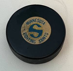 lot 177 image: Minnesota Fighting Saints Game Hockey Puck, Vintage