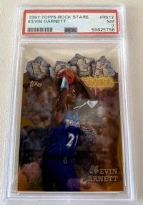 lot 17B image: Kevin Garnett PSA 7 NM Die Cut 1997 Topps Rock Stars #RS12 Basketball Card