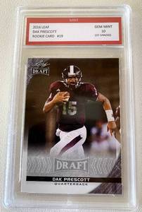 lot 61A image: Dak Prescott RC Graded 10 Gem Mint 2016 Leaf #19 Rookie Football Card