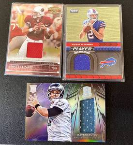lot 147 image: 3 QB Relic and Numbered Football Cards - Leinart, Peterman, Barkley