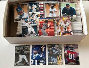 lot 215A image: Shoebox Full of 1980s and 1990s Baseball and Football Cards - Unsearched with Stars - 4.5 Pounds of Cards