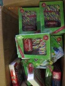 box of candy canes and sugar cookie making kits in date