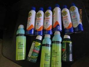9 bottles of sunscreen and 2 foot pain spray