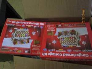 box of gingerbread cottage kits in date Best by 072024