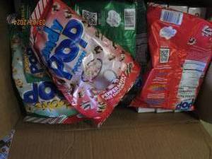 box of various popcorn flavors and kits