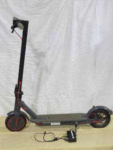 lot 8 image: AovoPro ES80 Electric Scooter - 8.5 Solid Tires, 350W Motor , up to 19 Miles Long-Range and 19 MPH