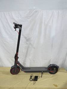 lot 10 image: AovoPro ES80 Electric Scooter - 8.5 Solid Tires, 350W Motor , up to 19 Miles Long-Range and 19 MPH Portable Folding Commuting Scooter