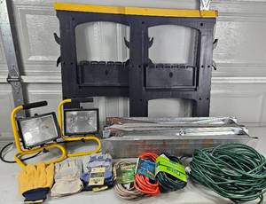 lot GAR09 image: Garage Essentials - Sawhorses, Two Work Lights, Work Gloves and 6 Extension Cords