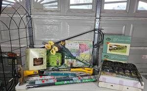 lot GAR17 image: Landscape Essentials - Trellis, Garden Border Fence, Solar Lights, Gazing Ball, Bamboo Stakes, Weed Whip