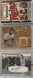lot CARD09 image: Michael Cuddyer Game Used Jersey Trading Card, Rod Carew Lasting Legend Jersey Card and 1992 MN Twins playing cards