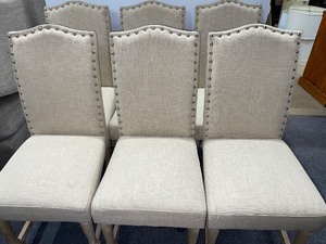 lot 10 image: 6 High-backed Upholstered Chairs with tack trim