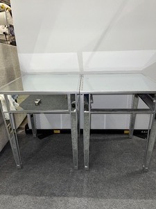 lot 30 image: Set of 2 Mirrored End Tables with tapered legs