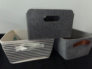 lot 52 image: Three Fabric-covered Storage Baskets
