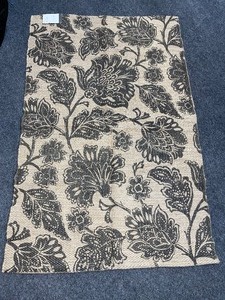 lot 140 image: Patterned Throw Rug