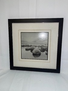 lot 435 image: Wall Decor - Rocks By The Ocean w Black Frame