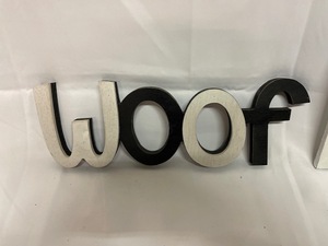 lot 407 image: Wall Decor - Wooden Woof & white paw background