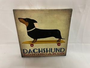 lot 400 image: Wall Decor - Dog on Skateboard