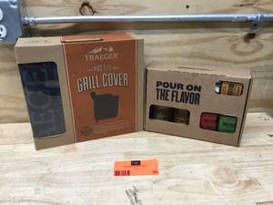 lot 39 image: Traeger Pro 575 Grill Cover  BBQ Sauce and 3 Seasonings