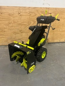 lot 14 image: RYOBI 40V HP BRUSHLESS WHISPER SERIES 22 TWO-STAGE SNOW BLOWER KIT (2 Batteries 6Ah and charger included.
