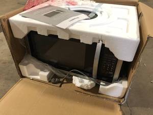 Farberware Professional 1.3 cu. Ft. 1000-Watt Countertop Microwave Oven in Stainless Steel  Customer Returns See Pictures