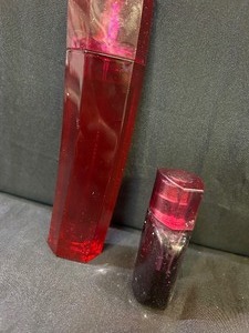 Two Bottles of Womens Perfume (Escada, Lacrosse)