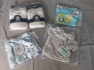 Assortment of New with Tags NewBorn Outfits