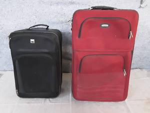 Two Rolling Suitcases