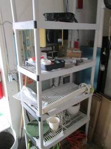 Plastic Keter 6-tier storage shelf (7 ft tall) plus content which includes painting and outdoor tools and supplies )