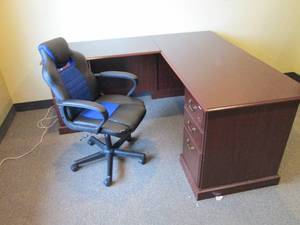 Nice L-Shape wood 5-drawer desk and executive padded rolling office chair