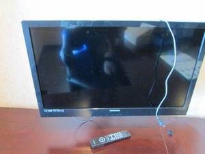 Magnavox 32 flat-screen TV with remote and wall mount (buyer responsible to bring proper tools and remove from structure)