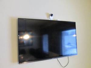 Sanyo 42 flat-screen TV with remote and wall mount (buyer responsible to bring proper tools and remove from structure)