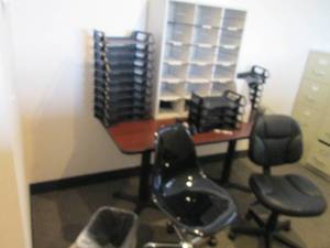 Metal framed laminate top office style table, (2) rolling office chairs and tons of desktop organizational supplies