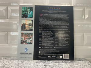 lot 36 image: IMAGIN- John Lennon The Definitive Film Portrait- Laser Disc
