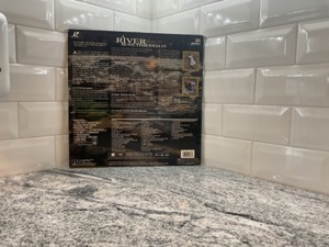 lot 118 image: A River Runs Thought It- Laser Disc