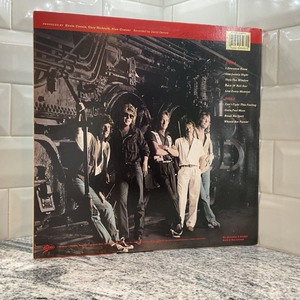 lot 220 image: Epic- Reo Speedwagon- Vinyl LP Record Album