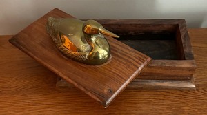 lot 67 image: Vintage Wooden Dresser Box Accented with a Brass Duck Lid