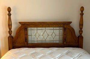 lot 71 image: Wooden and Leaded Glass Accented Vintage Queen Bed Frame