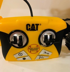 lot 378 image: Remote Control CAT Backhoe with Sounds and Bulldozer with Controls and Sounds