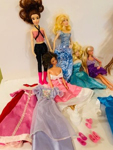 lot 384 image: Wonderful Grouping of Mattel Barbies Including Disney and Vintage with Clothing, Horses and Accessories