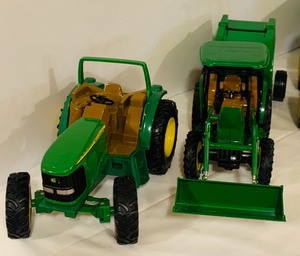 lot 293 image: Four Vintage John Deere Diecast Tractors