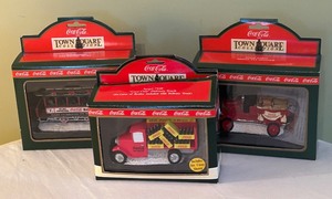 lot 324 image: Grouping of 5 Town Square Collection of Coca-Cola Figurines