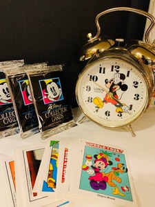 lot 391 image: Disney Collection, Including Mickey Alarm Clock, Books, Collector Cards and More